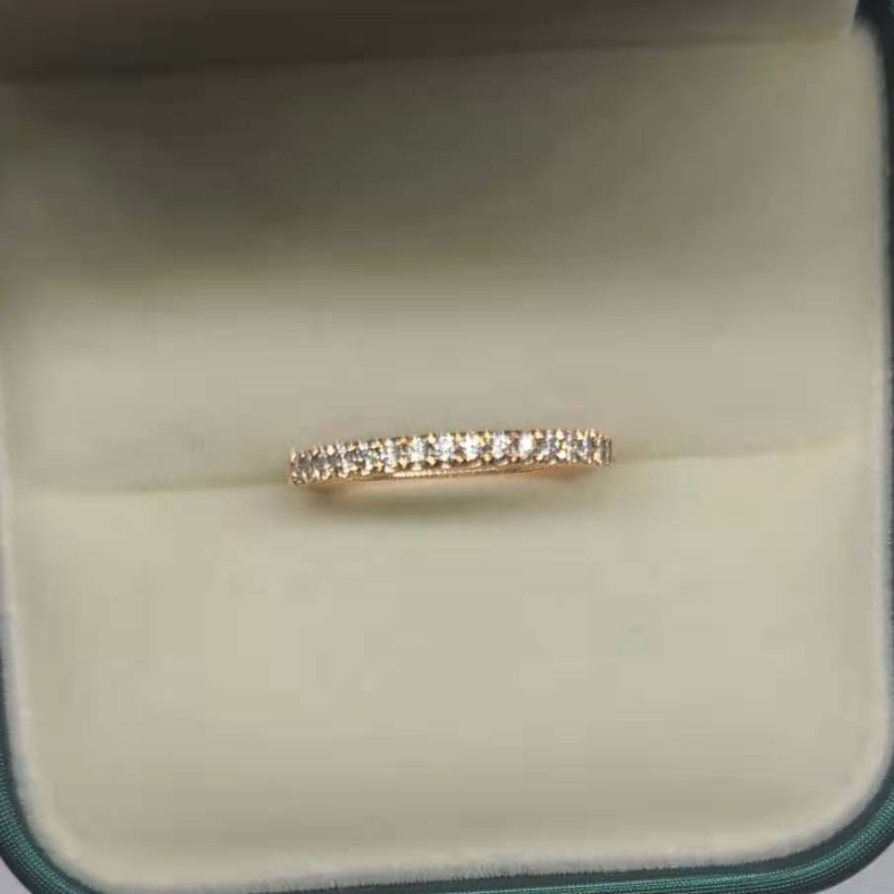 Solid 14k rose gold moissanite band